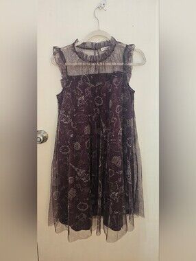 Axes femme burgandy tulle with gold travel designs